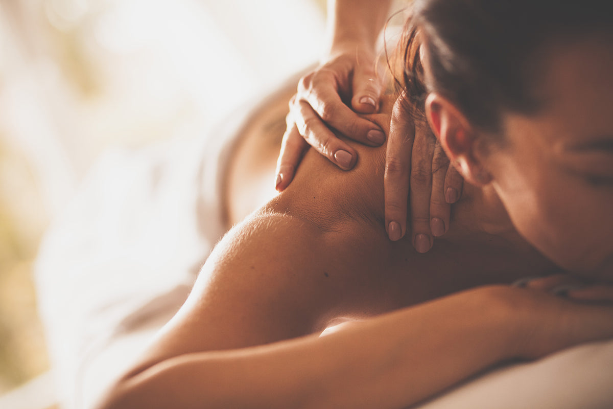 A relaxing massage session at Allora Day Spa